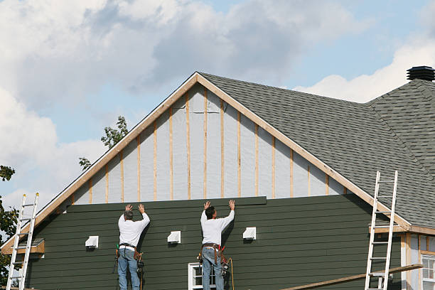 Professional Siding Repair technician working in South Hamilton, MA